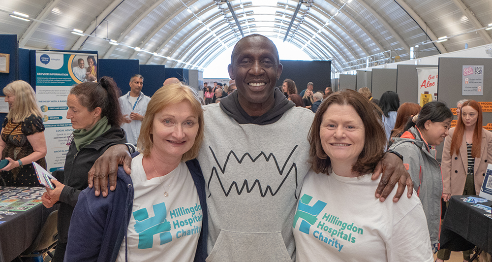 Shirley Clipp and Sibhan Ferguson of our charity team flanking Linford Christie OBE